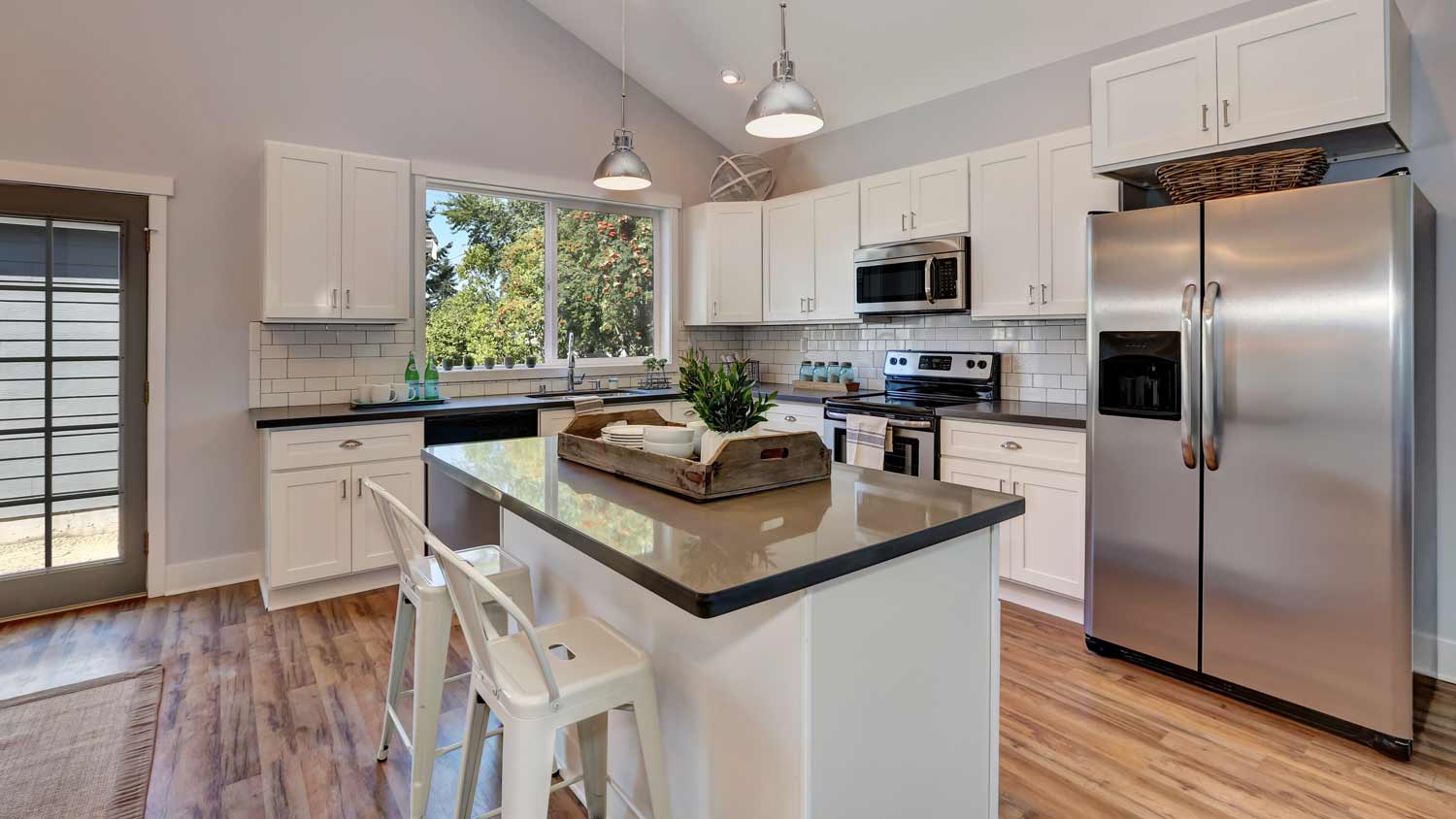 light grey kitchen with high ceiling