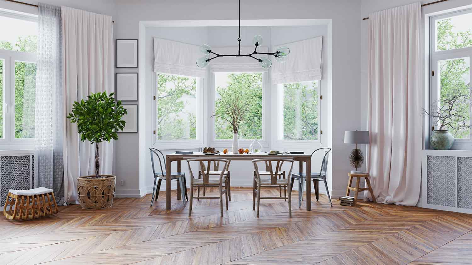 A view of a living room with a bay window