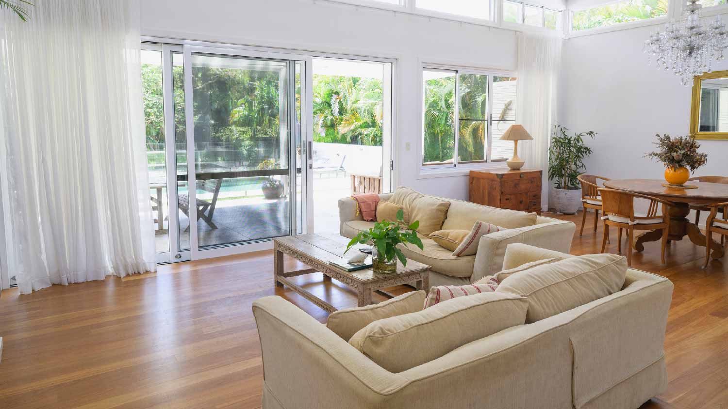 A living room with hardwood floors