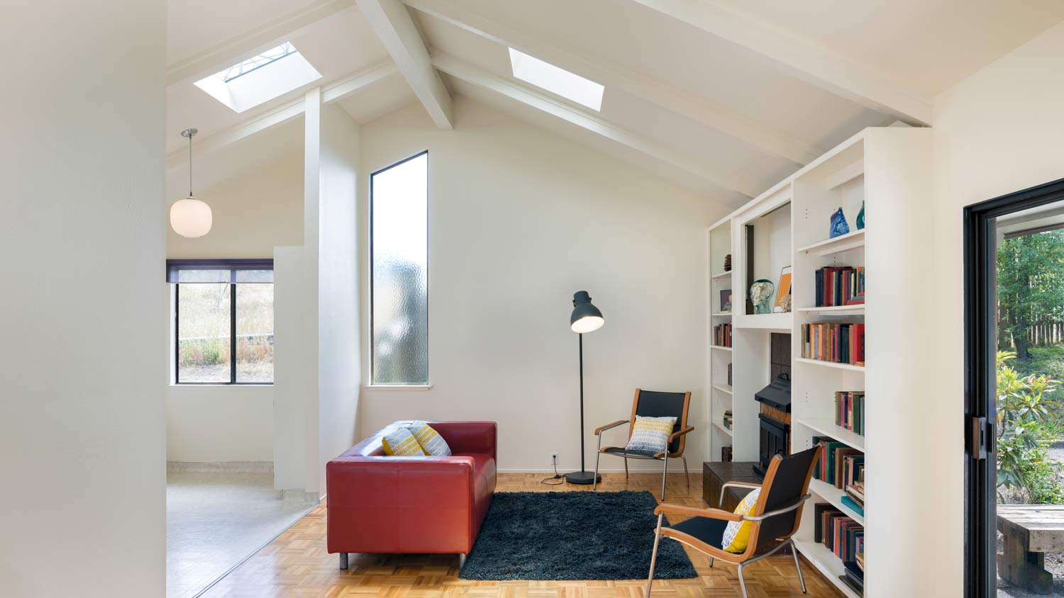 spacious living room with skylight