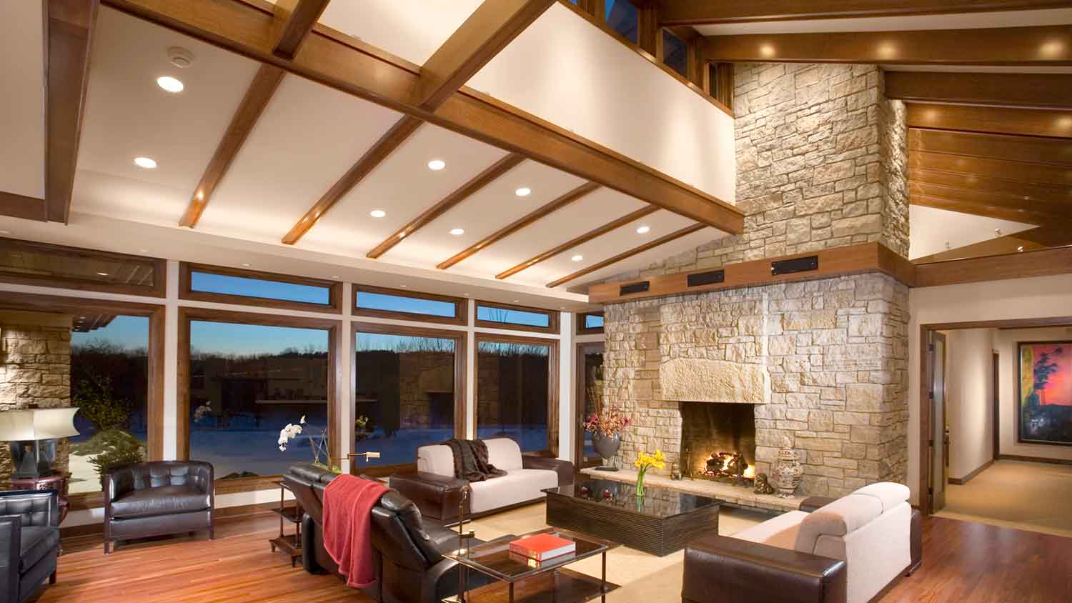 Livingroom with floor to ceiling stone fireplace