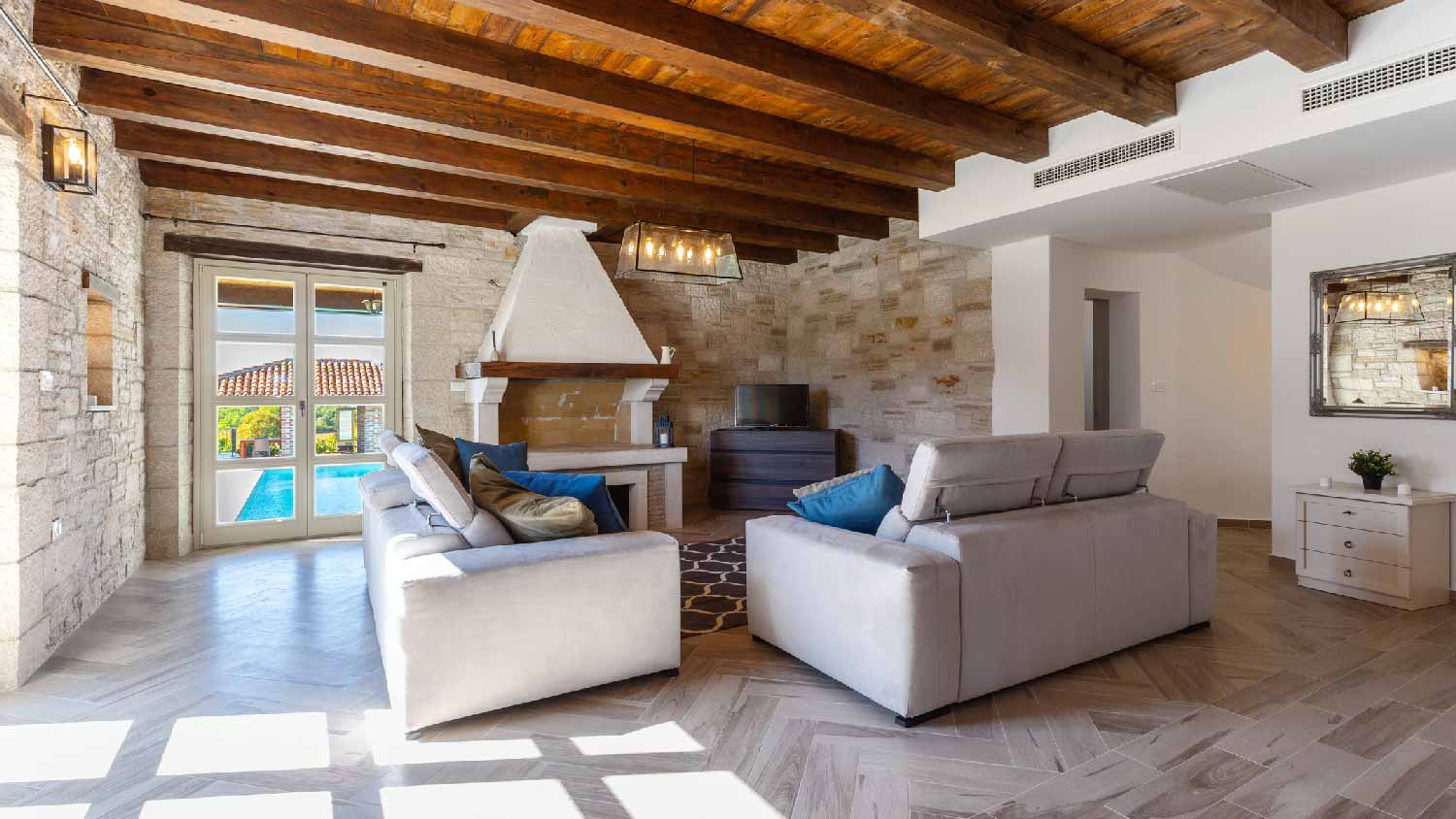 A living room with wooden ceiling