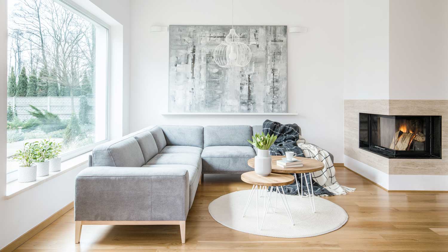 A lounge area with a fireplace and a square drywall corner