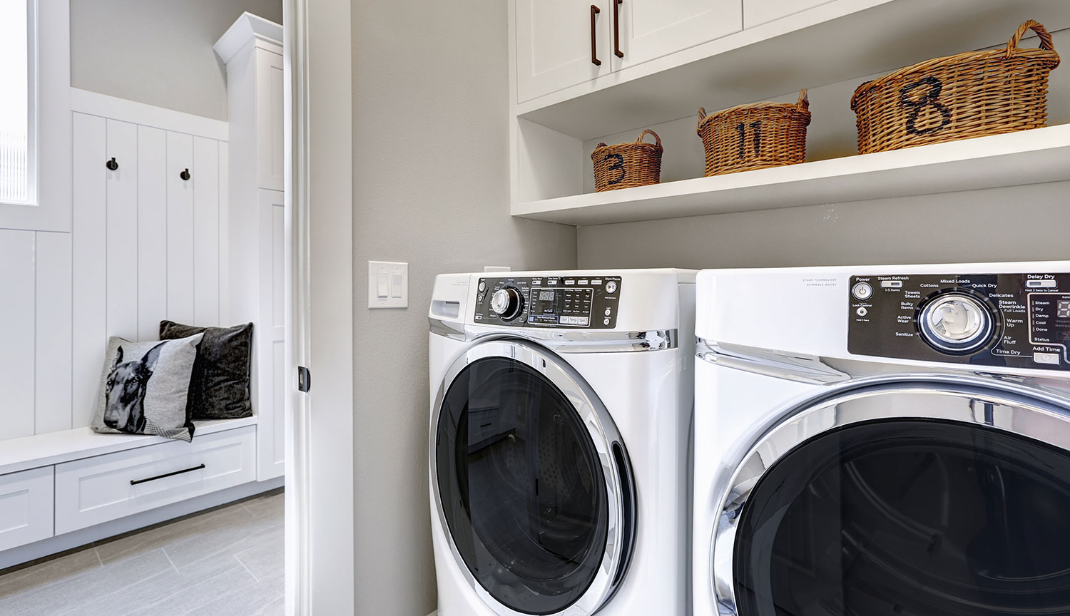 Washer and dryer in laundry room off a mudroom