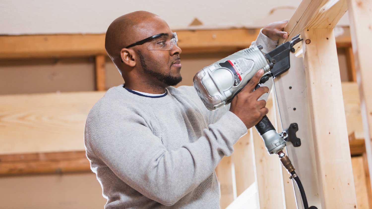 A man building a garage