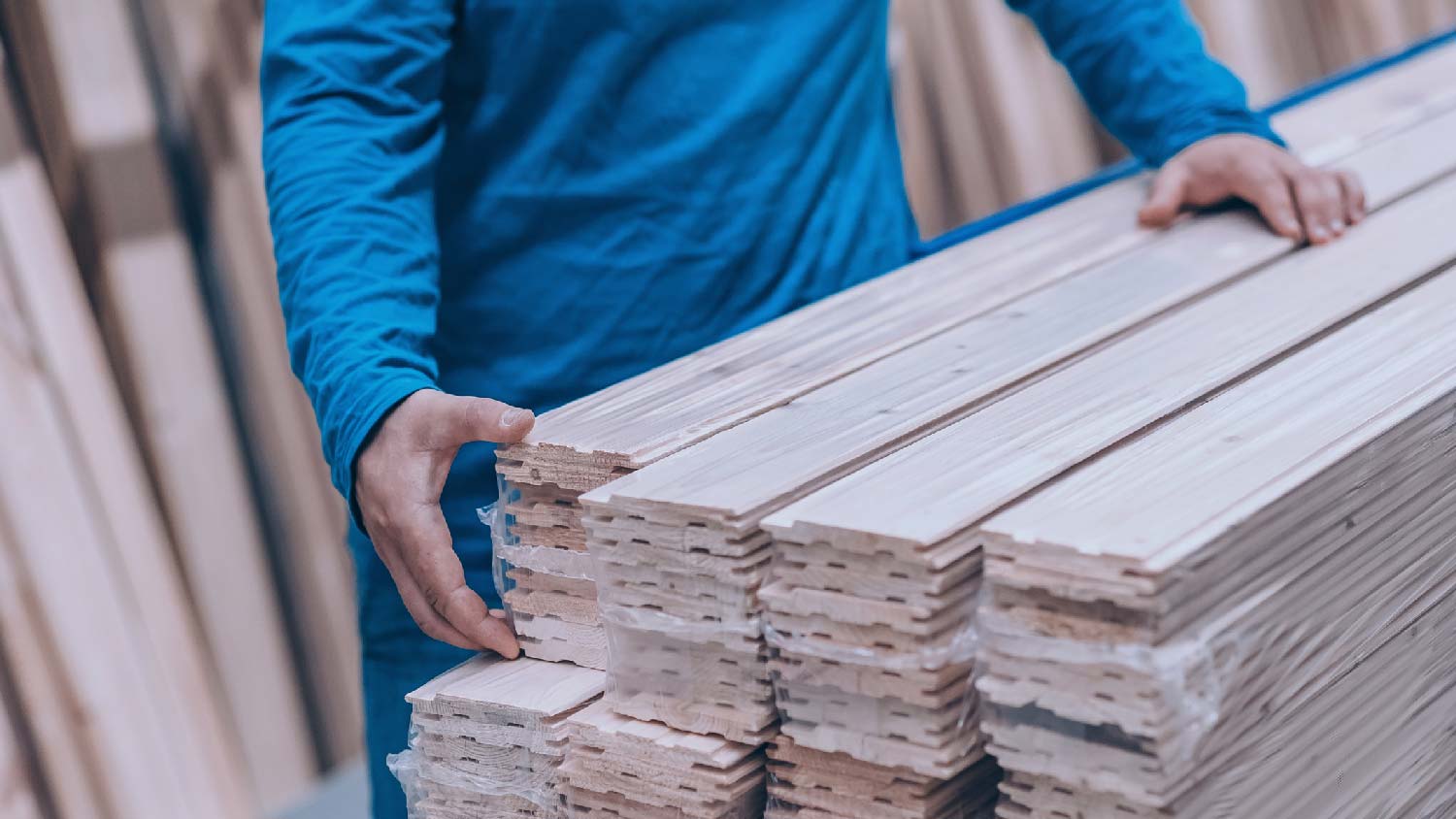A man buying siding for a house