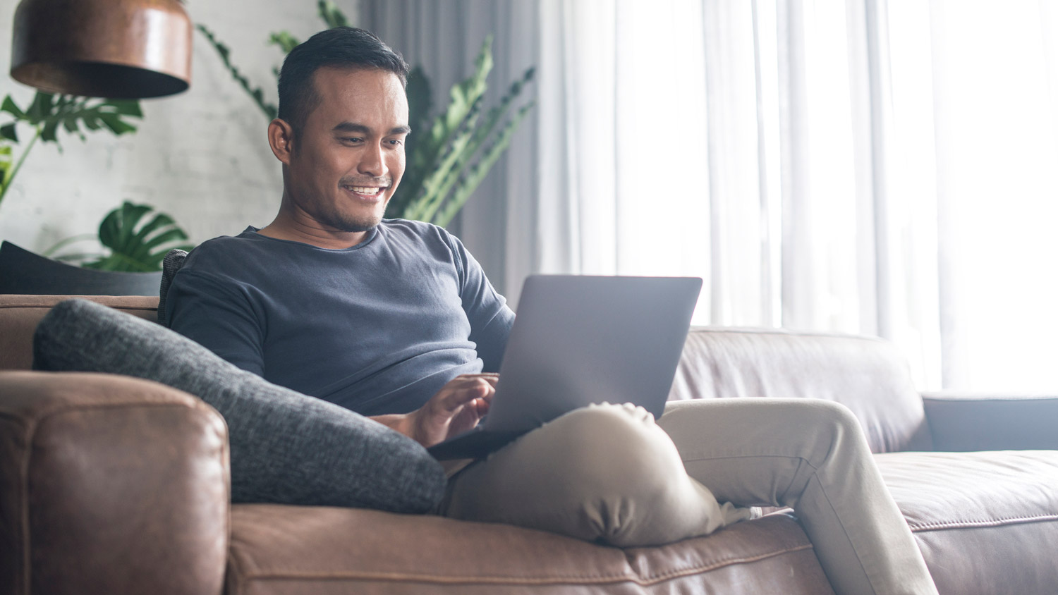 A man checking for new offer on his laptop