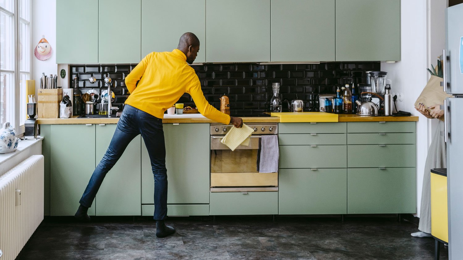 A man cleaning his kitchen