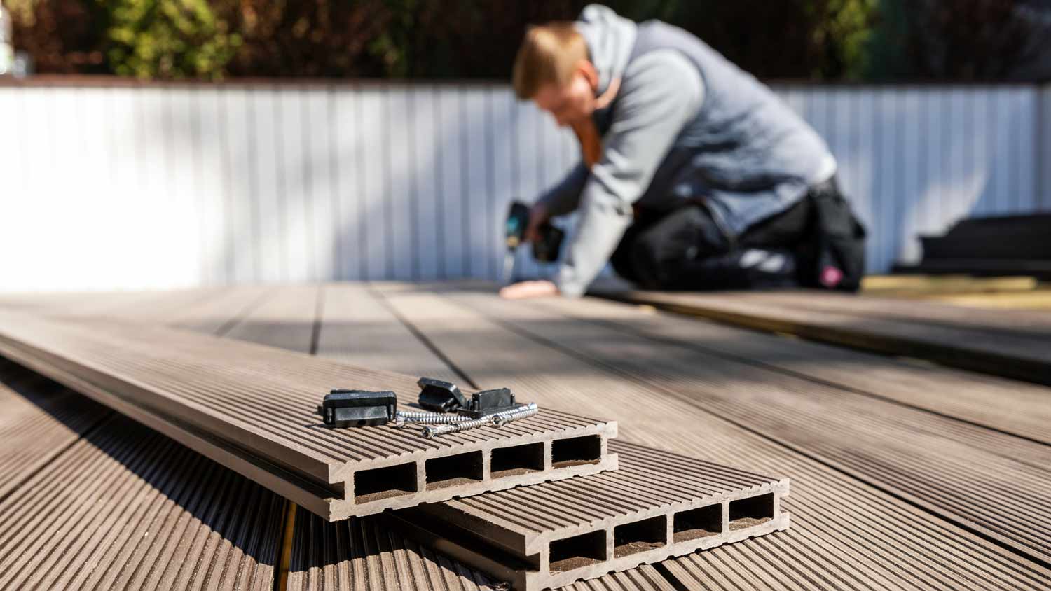 man installing deck