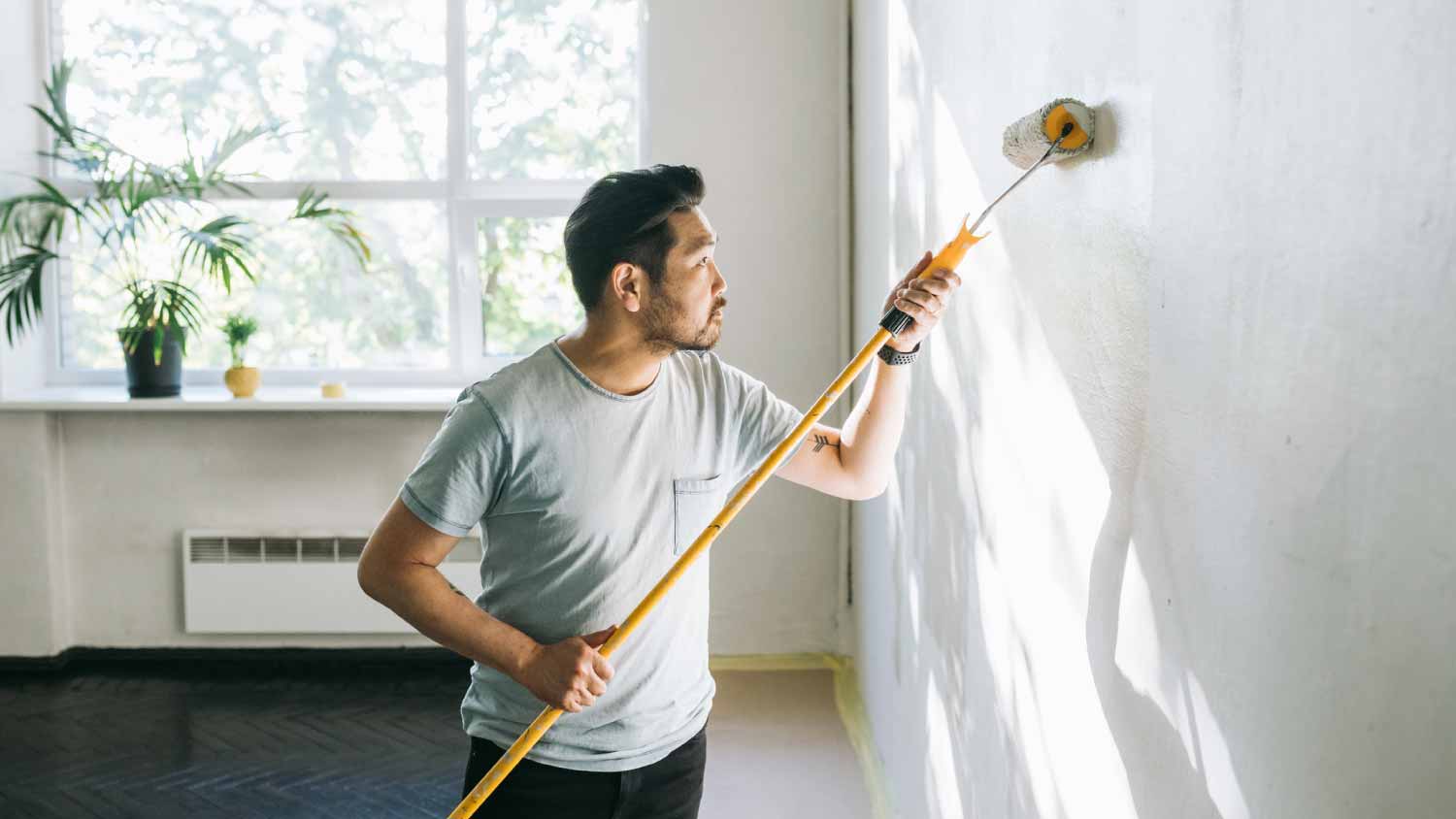 Man painting a wall