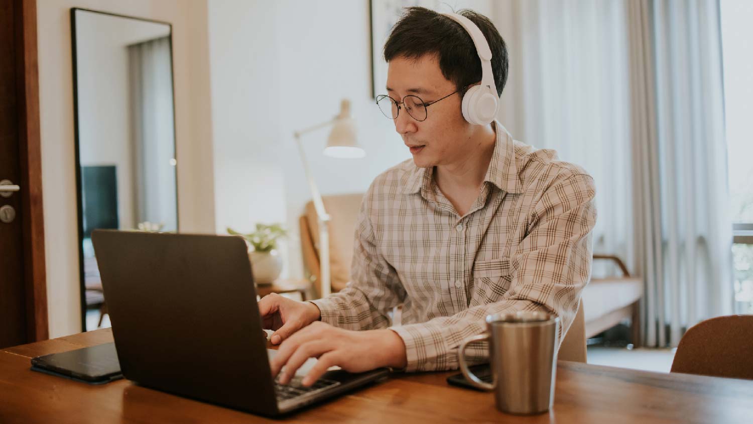 A man working from a home office