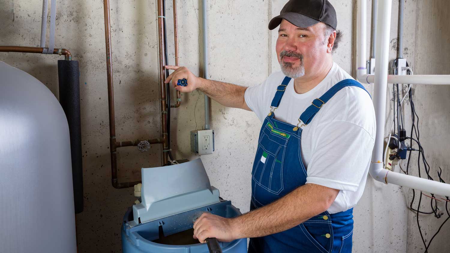 professional working on water softener