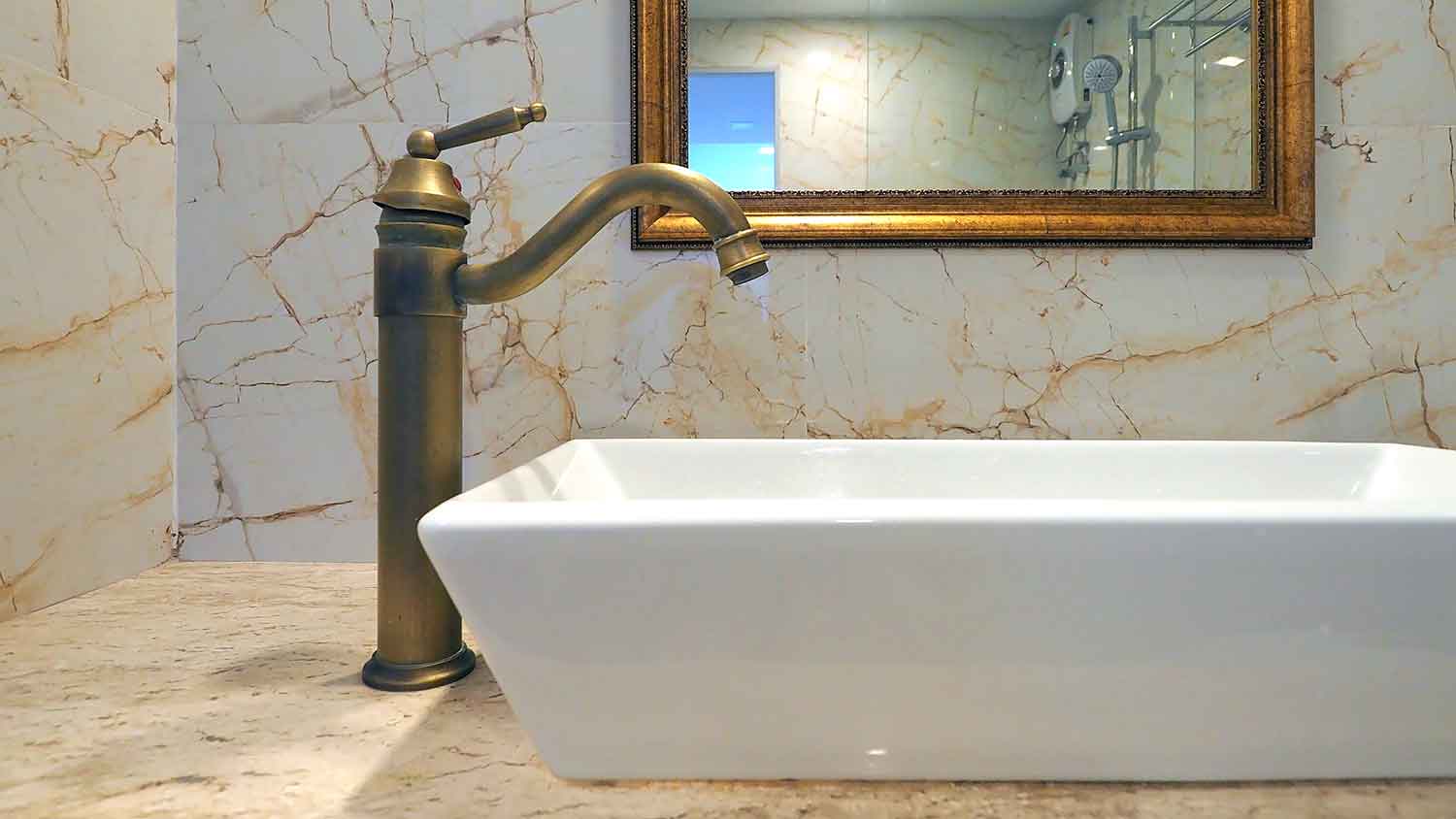 Marble bathrooms sink with deck mount faucet design