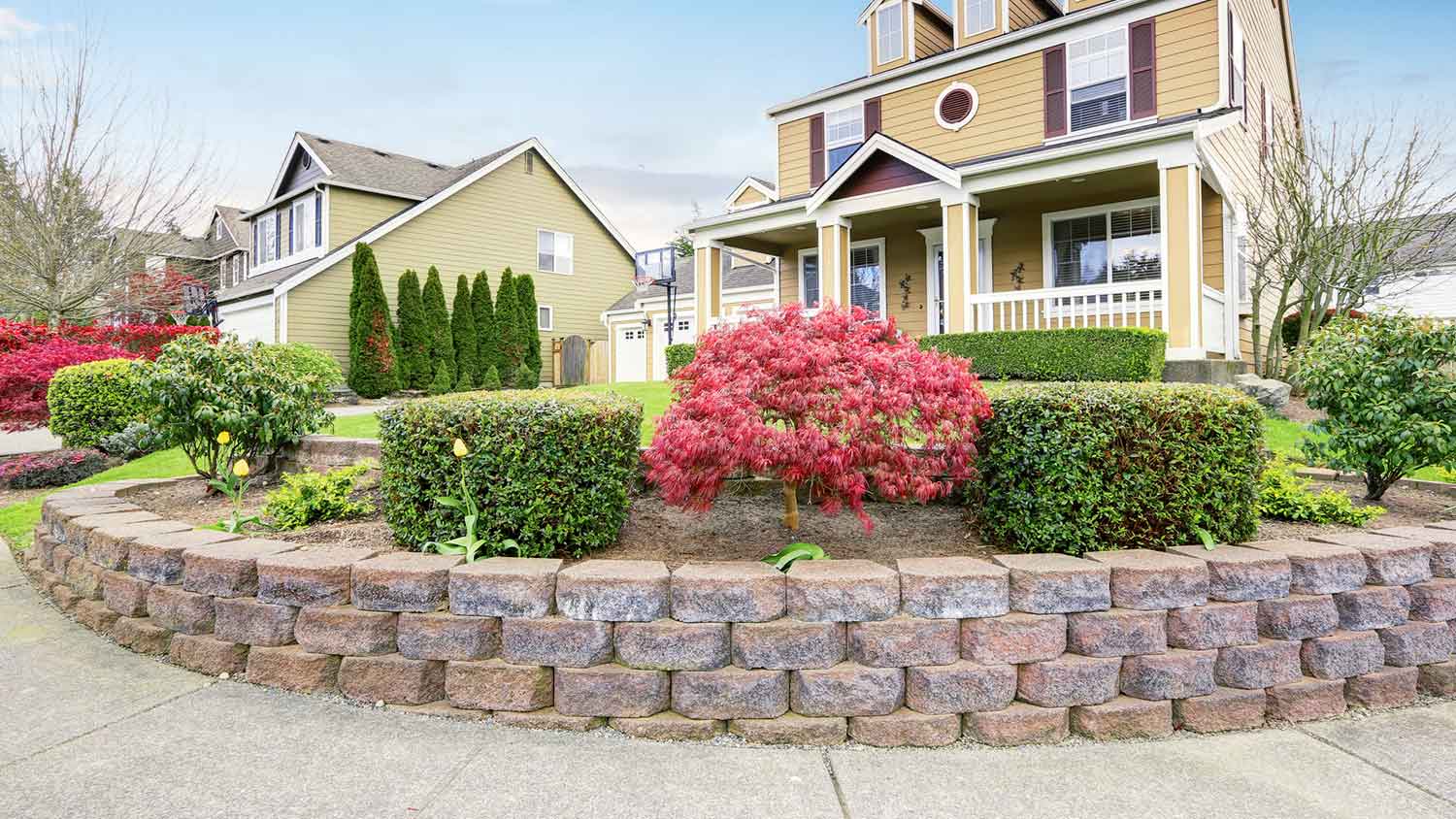 Retaining wall built in the front yard of a house