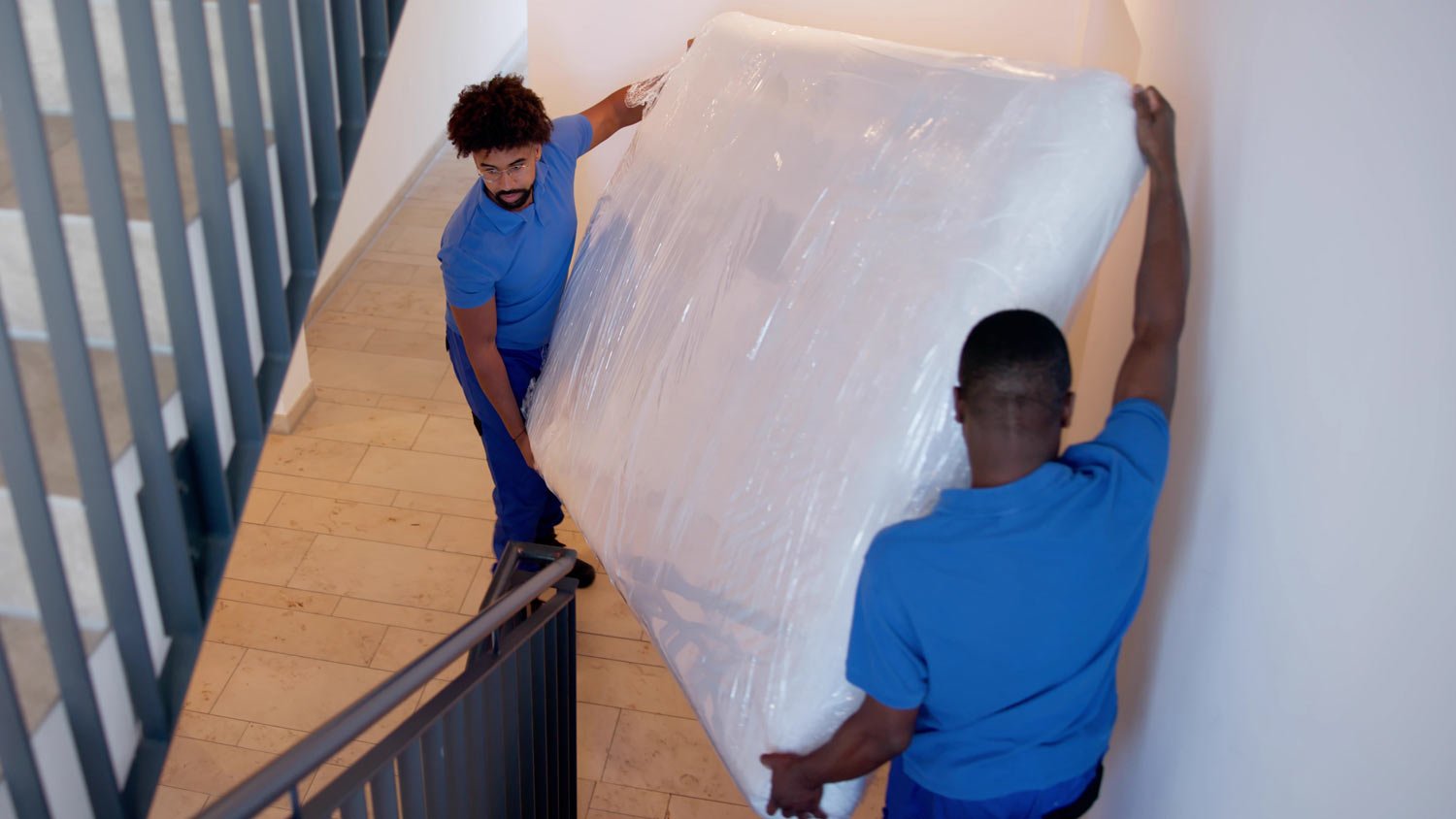 two men mattress removal service