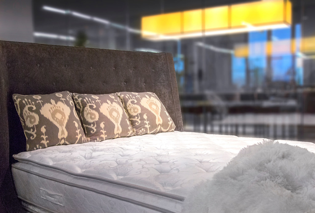 A mattress with pillows