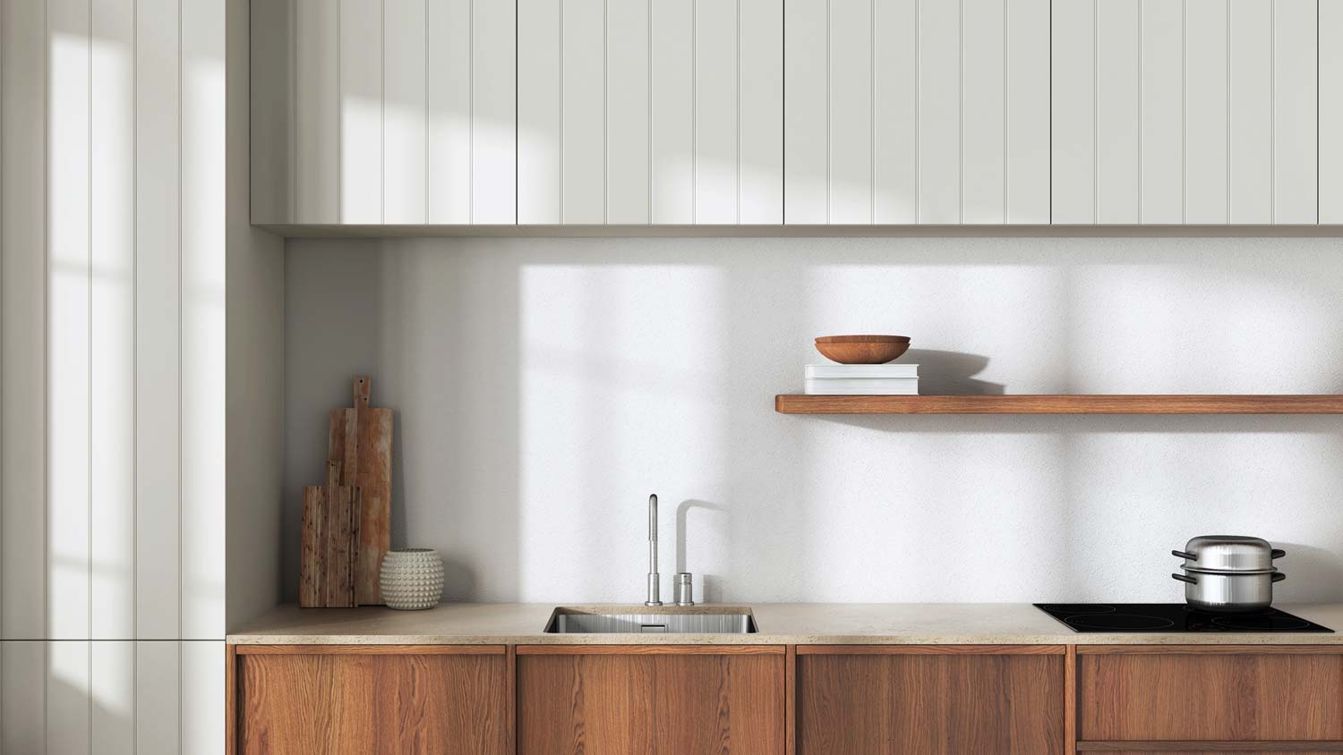 A minimal kitchen with travertine countertops