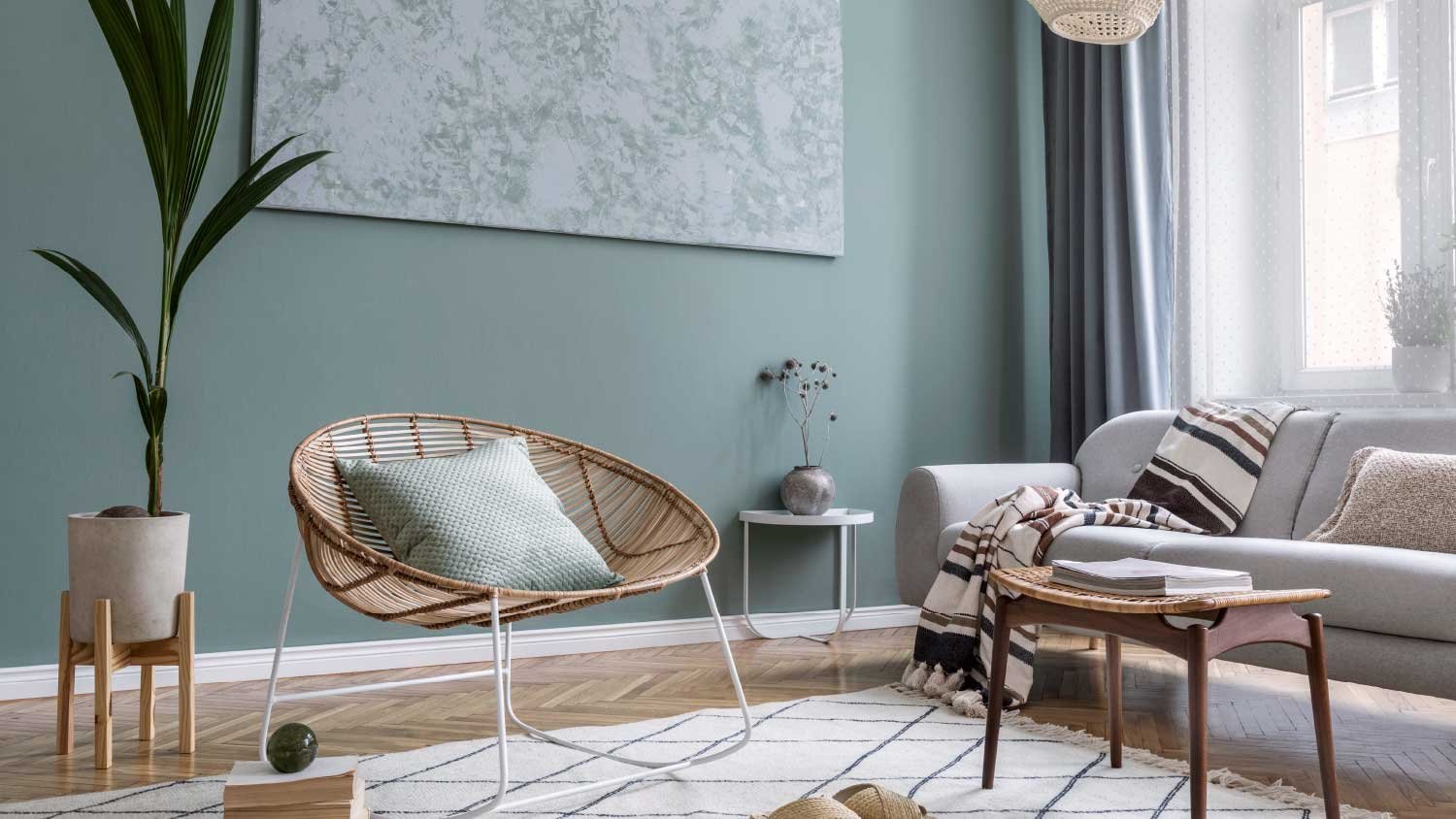 Modern and bohemian interior design with gray sofa