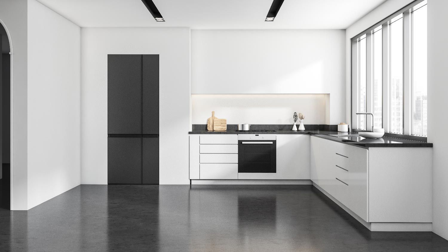 A minimalistic kitchen with concrete flooring