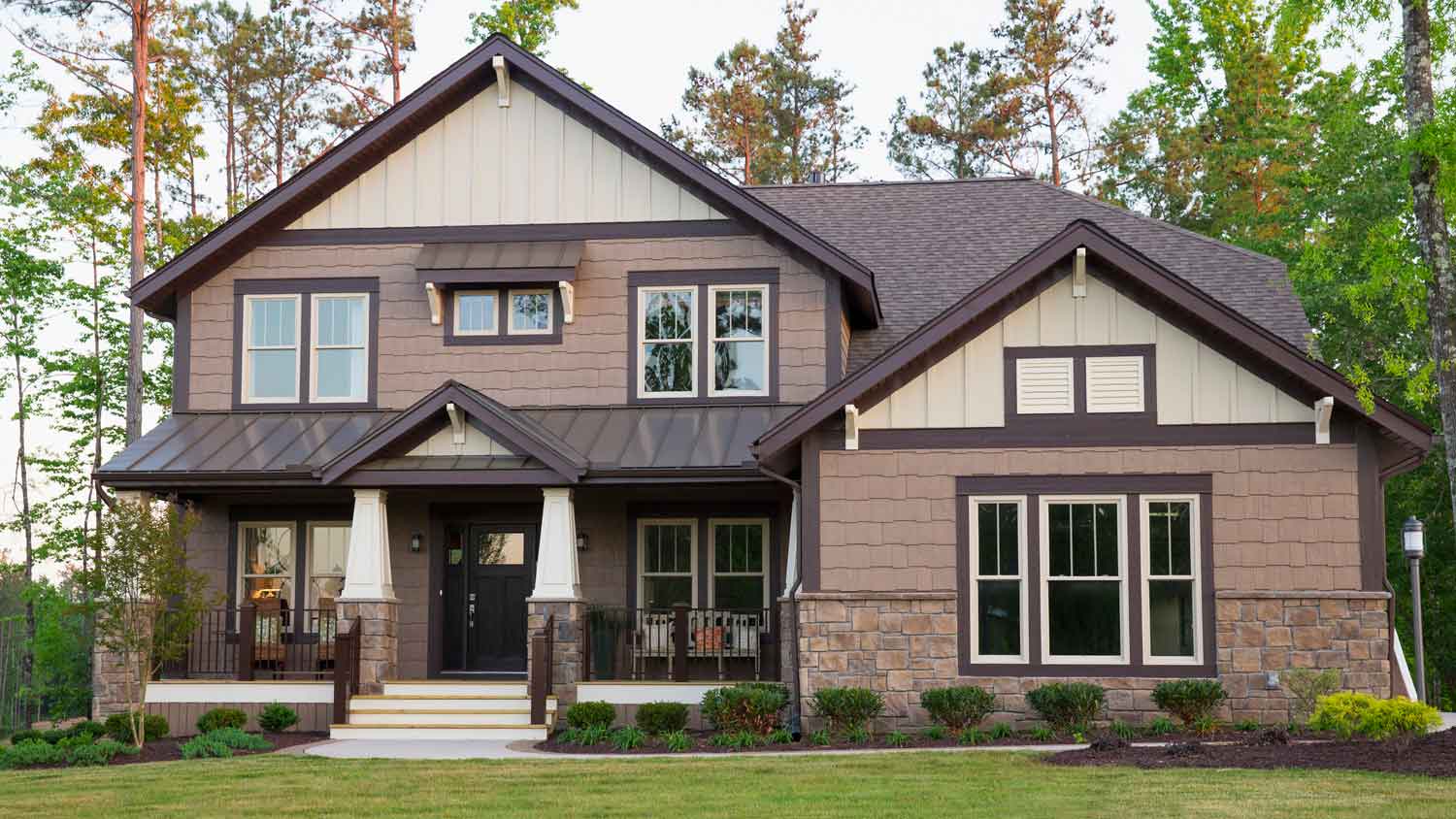 A mocha suburban house with a great front lawn