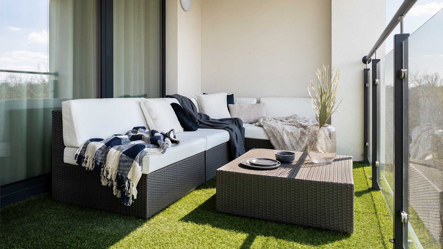 Apartment balcony with artificial grass