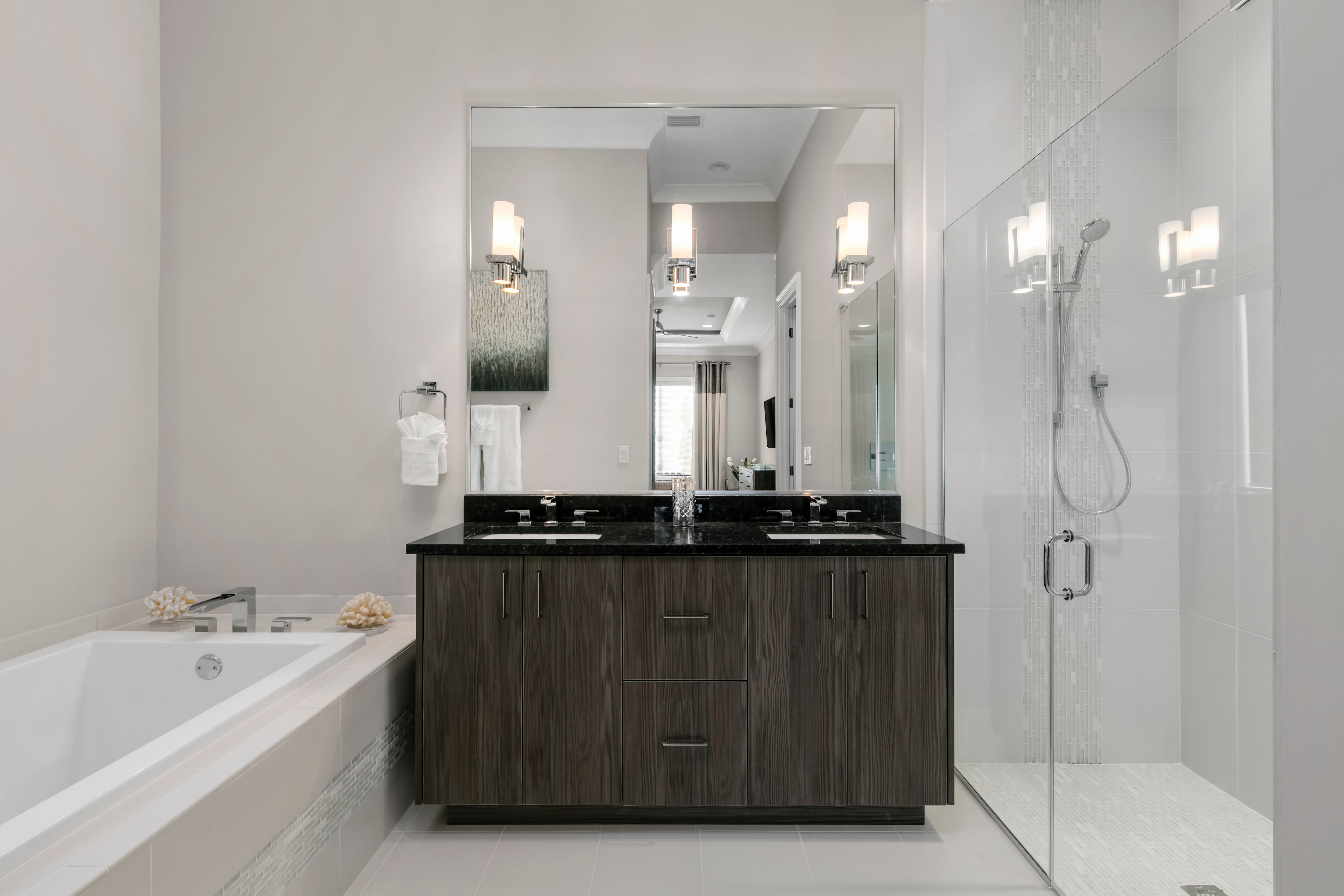 Large modern bathroom with walk-in shower and glass doors