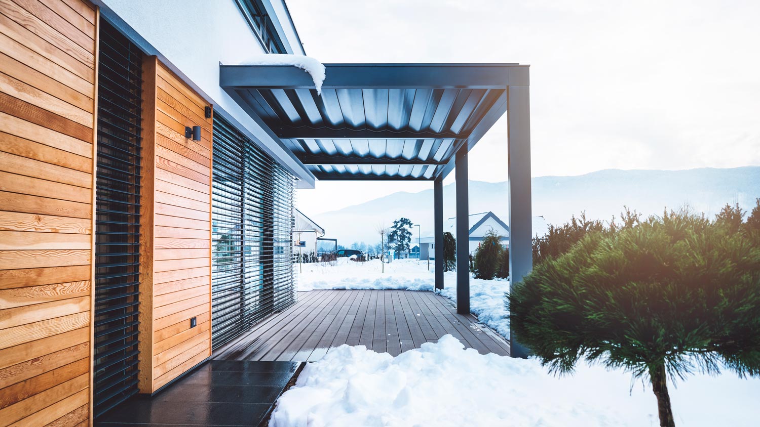 A modern wooden deck clear of snow