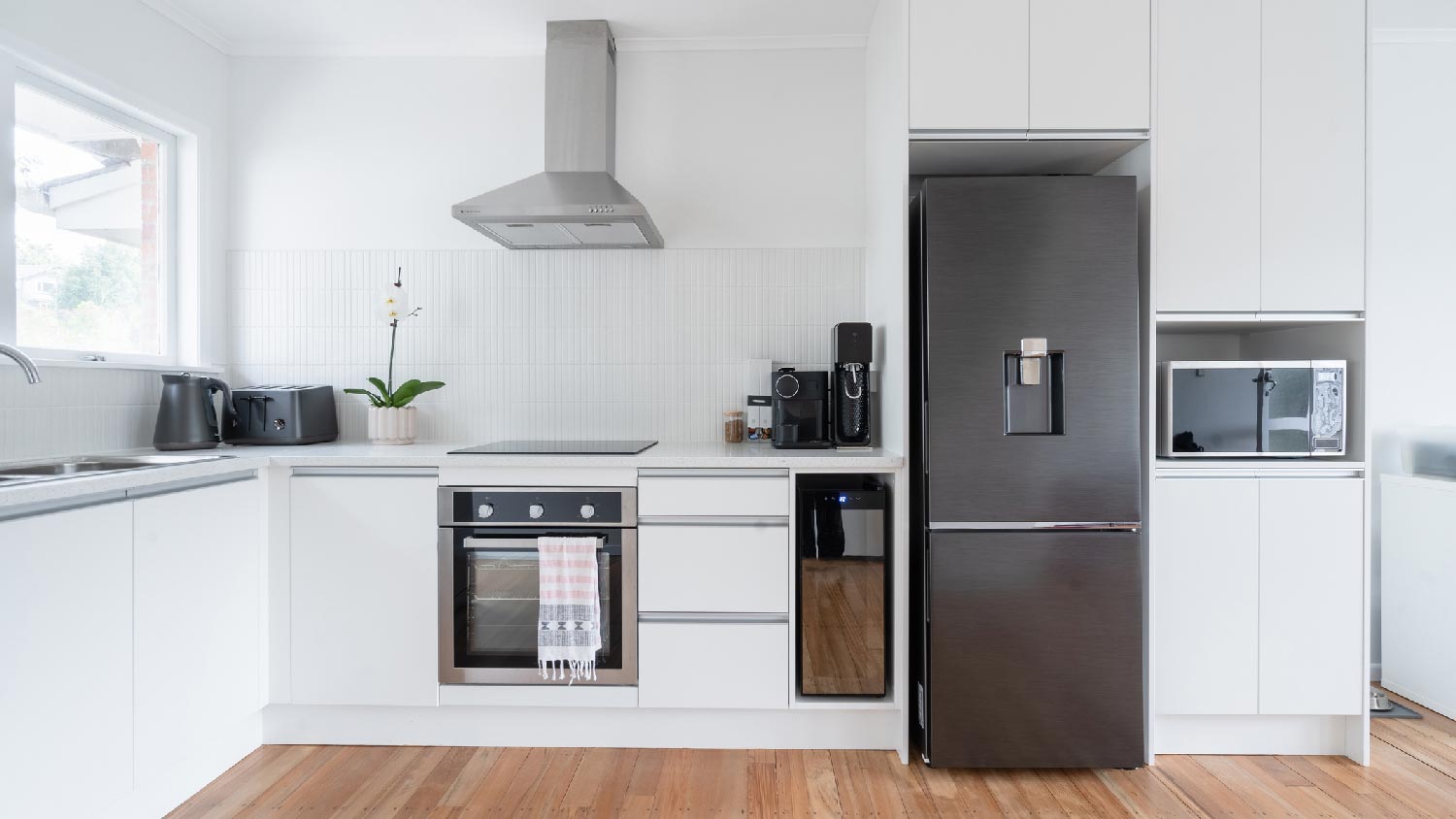 A modern kitchen with a slide-in range