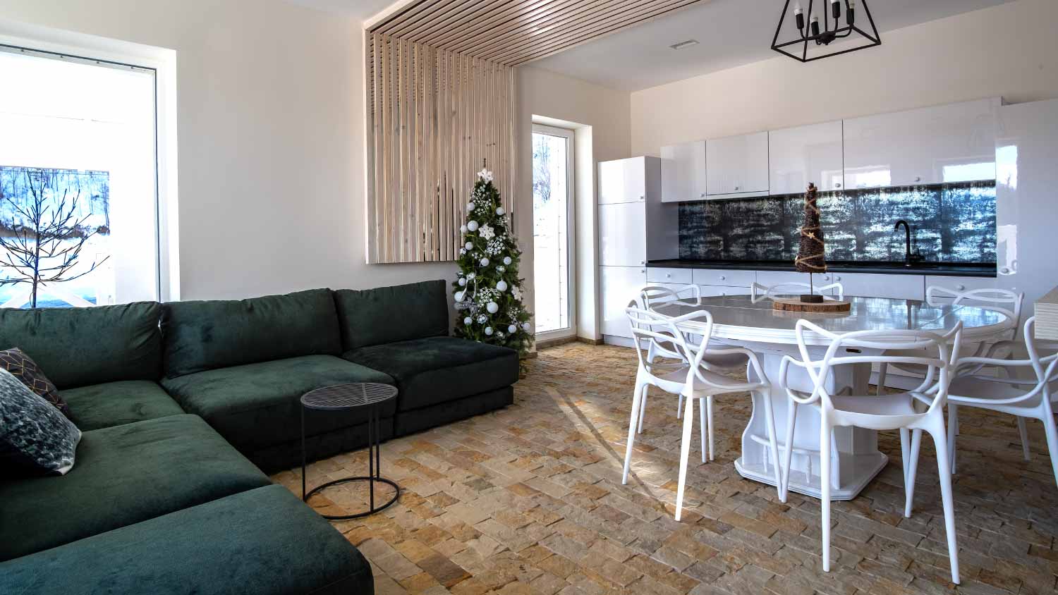 Interior of modern spacious kitchen with white walls