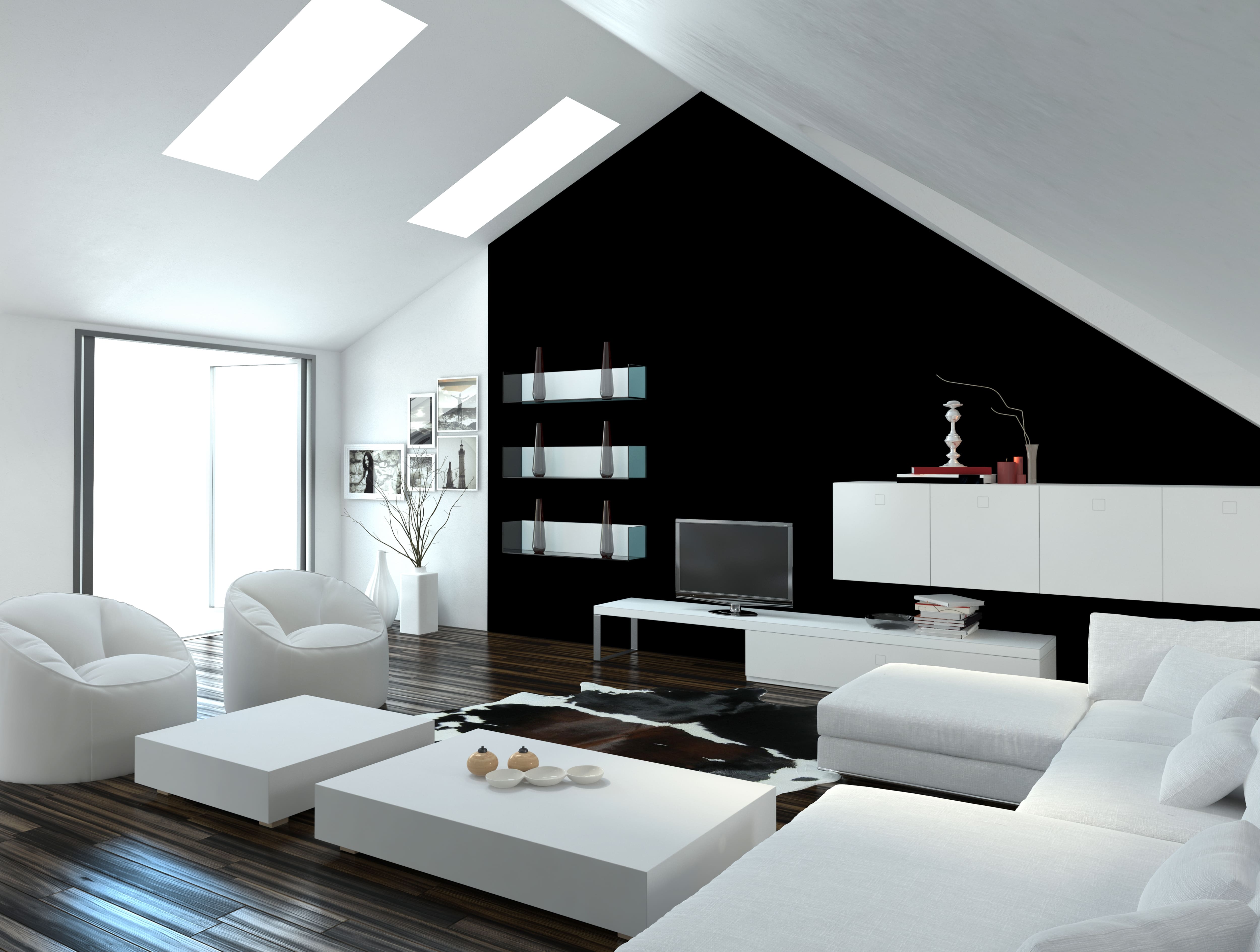 A modern loft with a black accent wall and white living room furniture