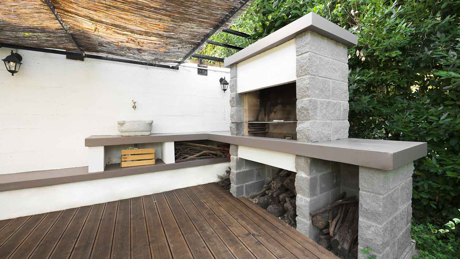 Modern outdoor kitchen with concrete countertops