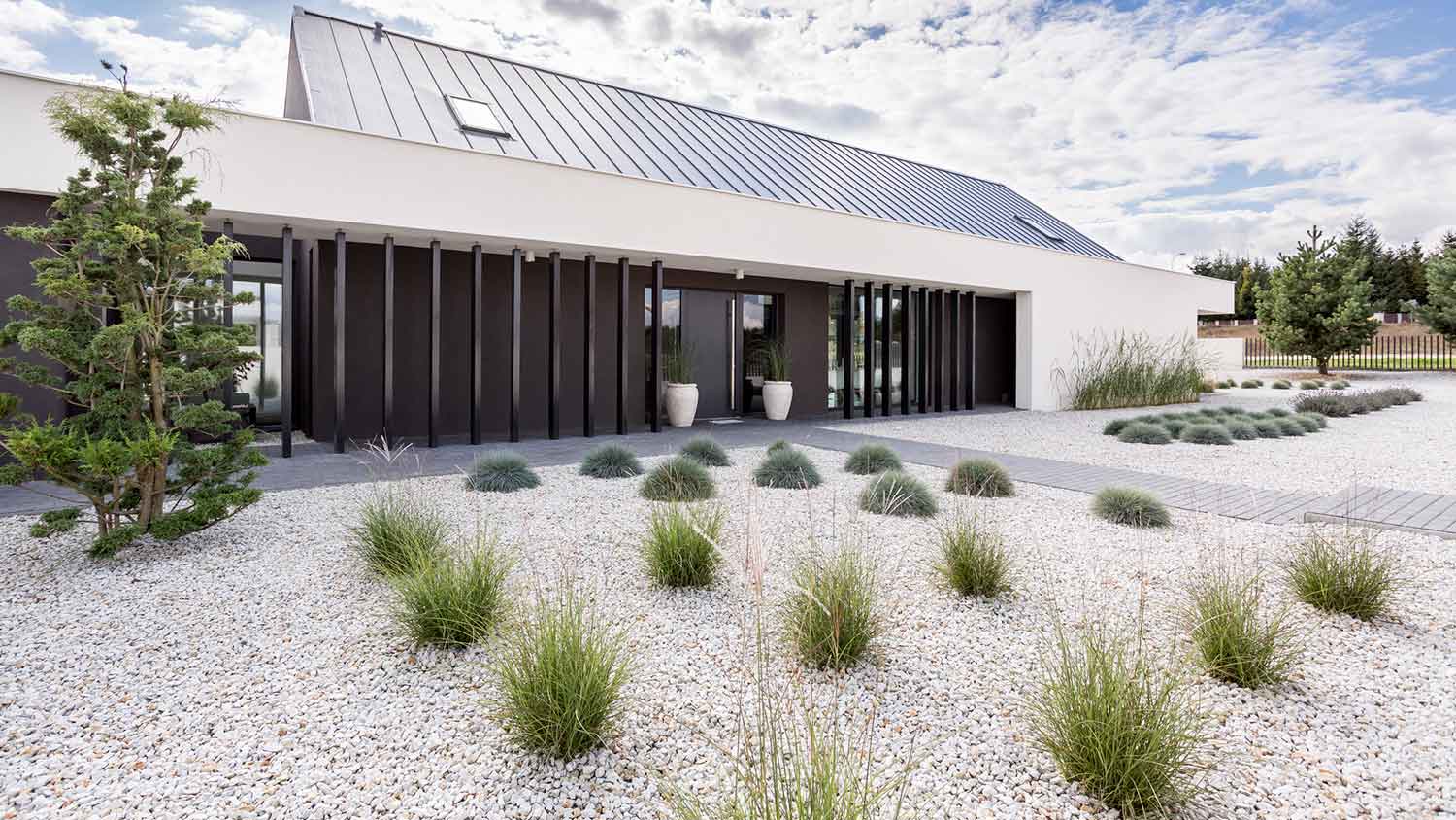 White gravel installed in modern villa landscaping 