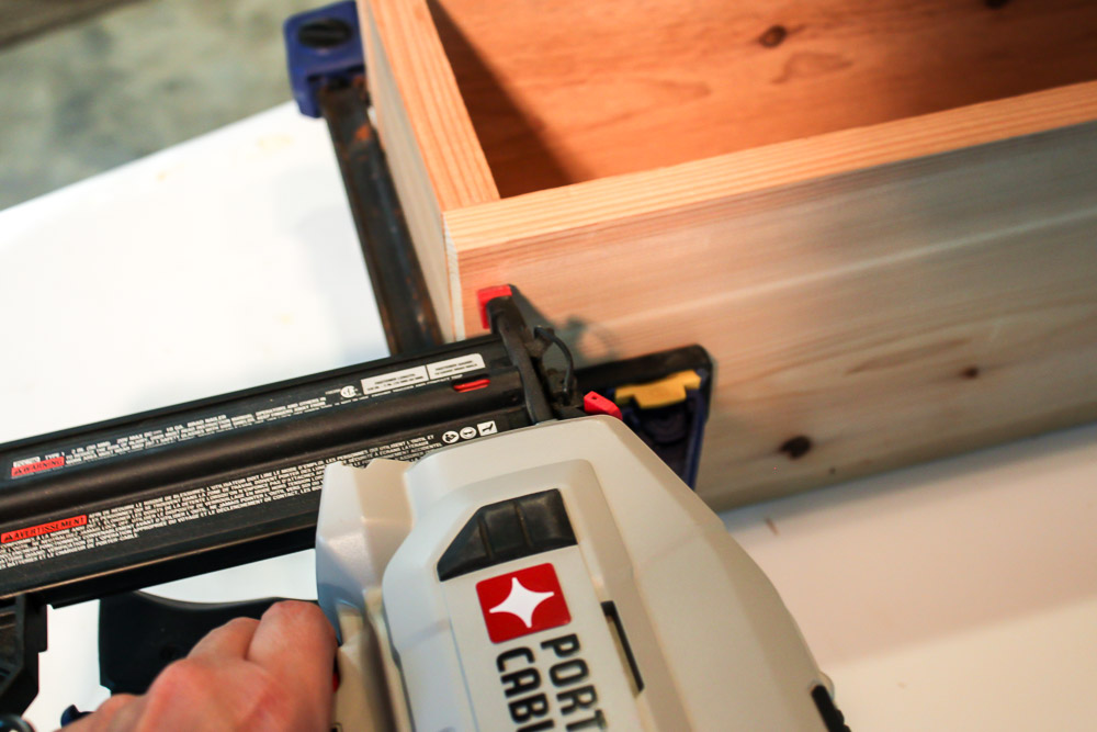 nailing boards together for DIY window box planter