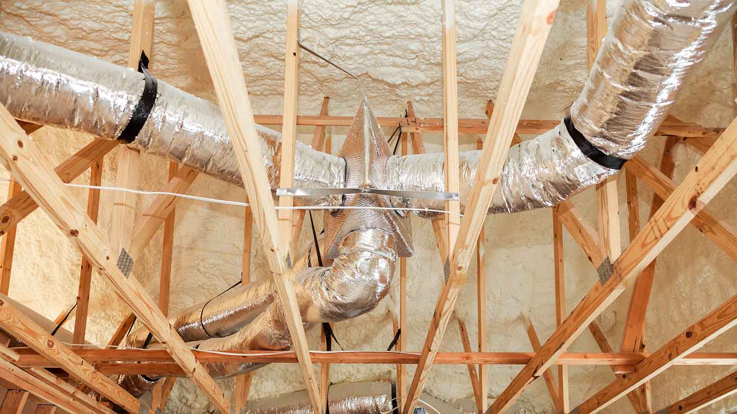 New home air ducts covered with mineral wool insulation