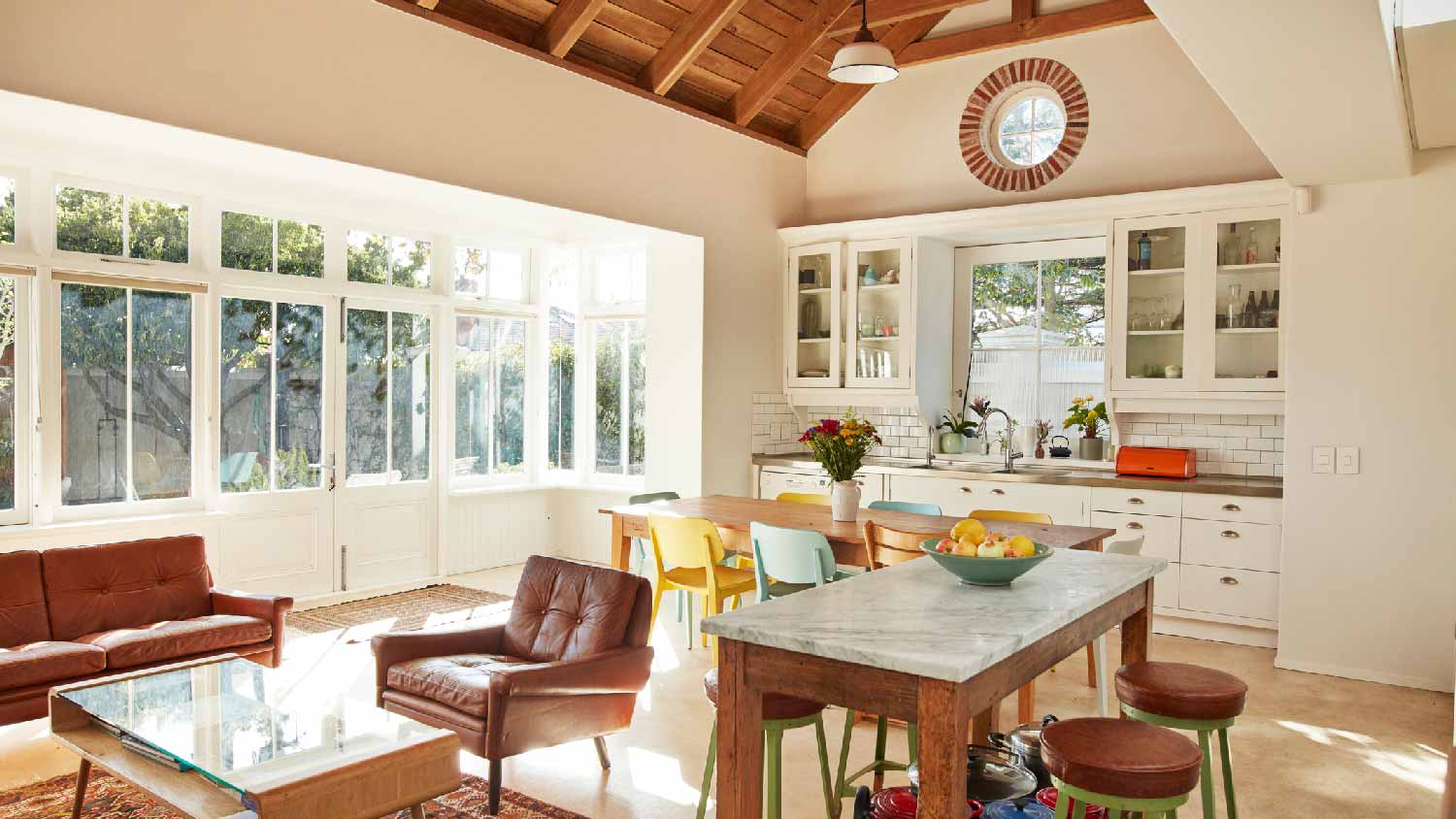 An open-space kitchen with a vaulted ceiling