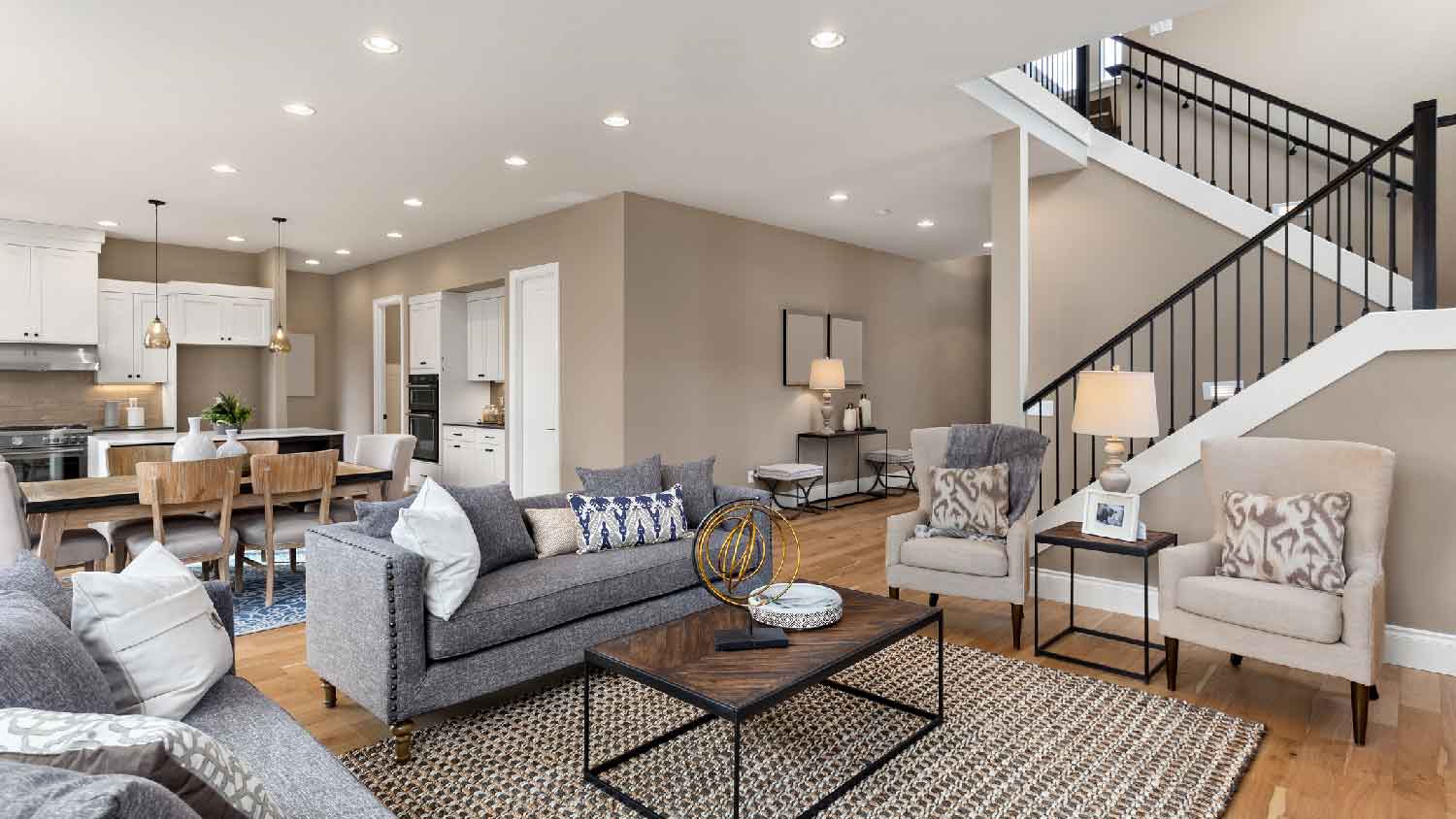 An open space living room with a flat ceiling