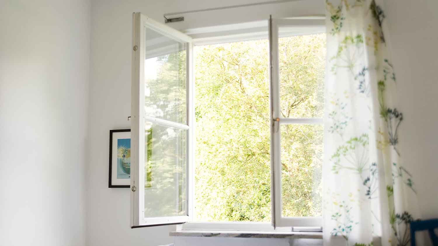 Bright room with white window open