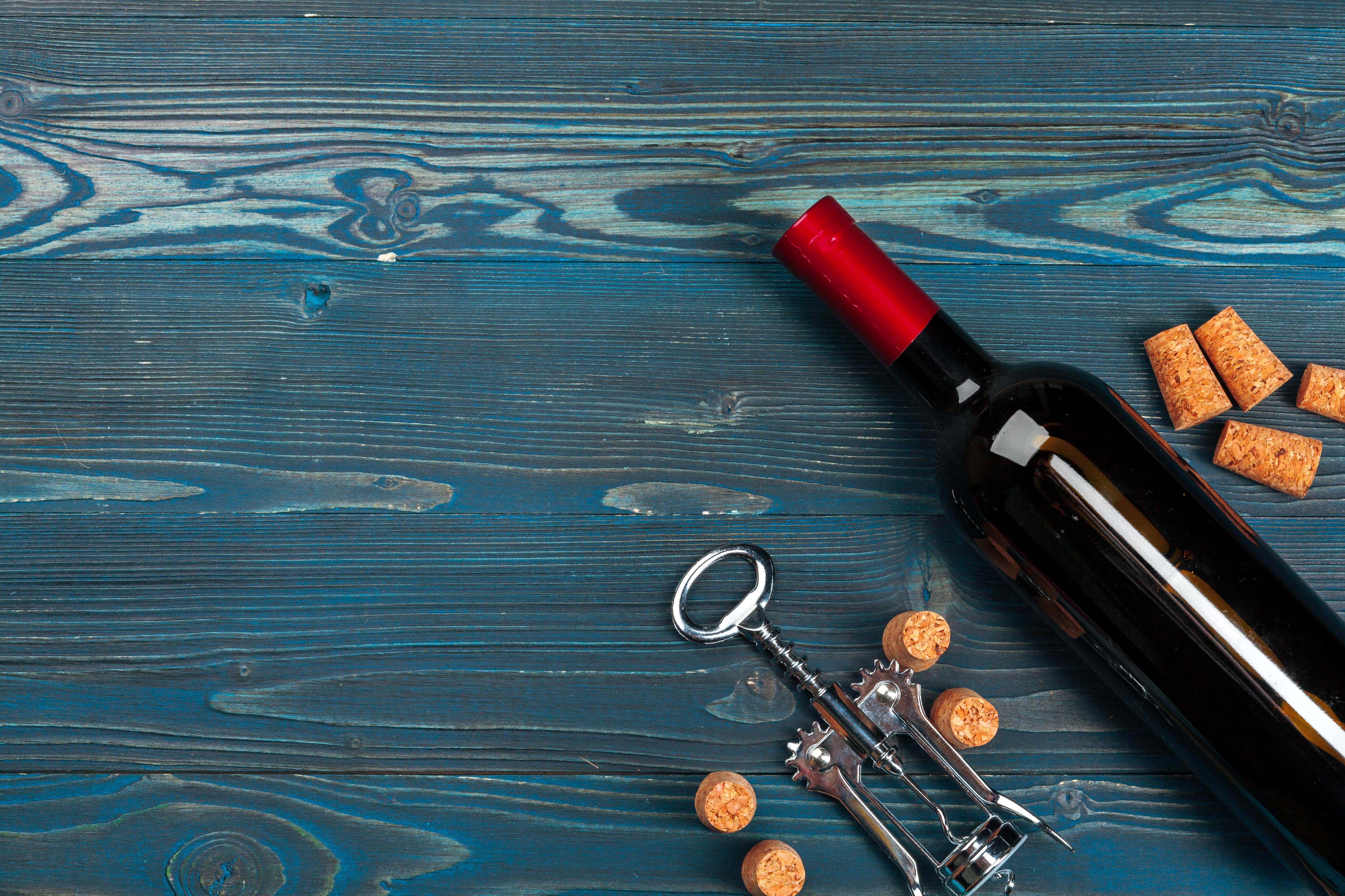 Wine bottle with corks and corkscrew