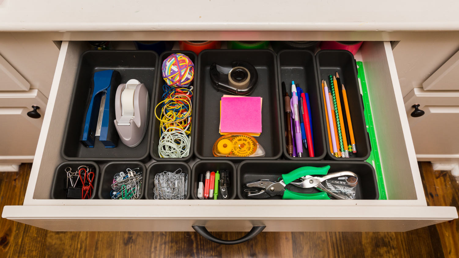 organizing homeschool classroom with containers