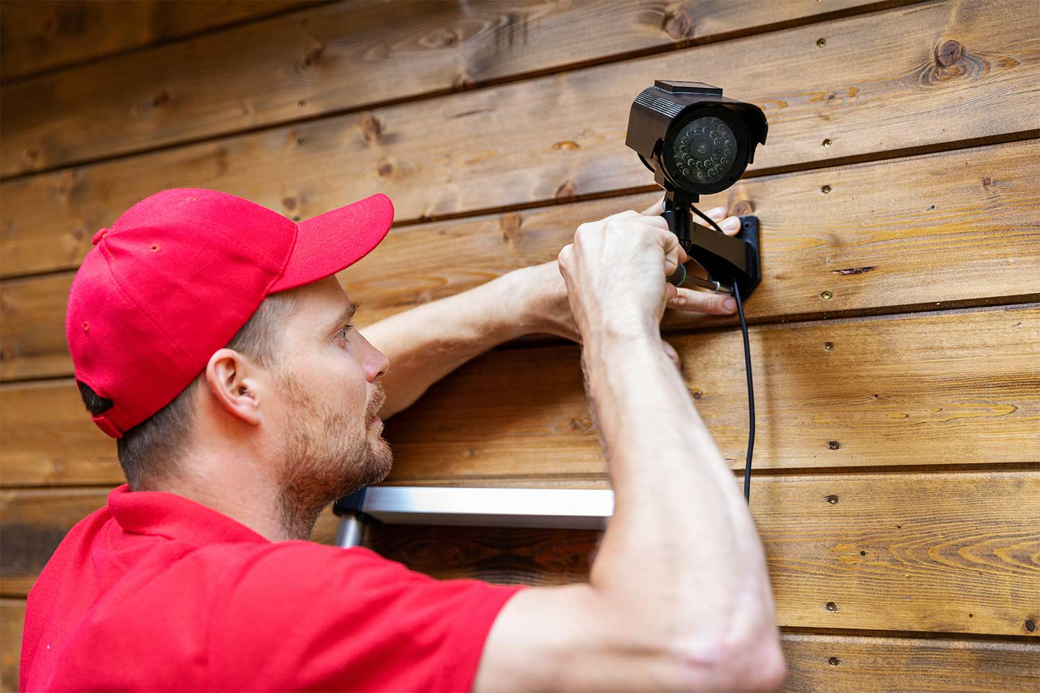 professional installing outdoor camera