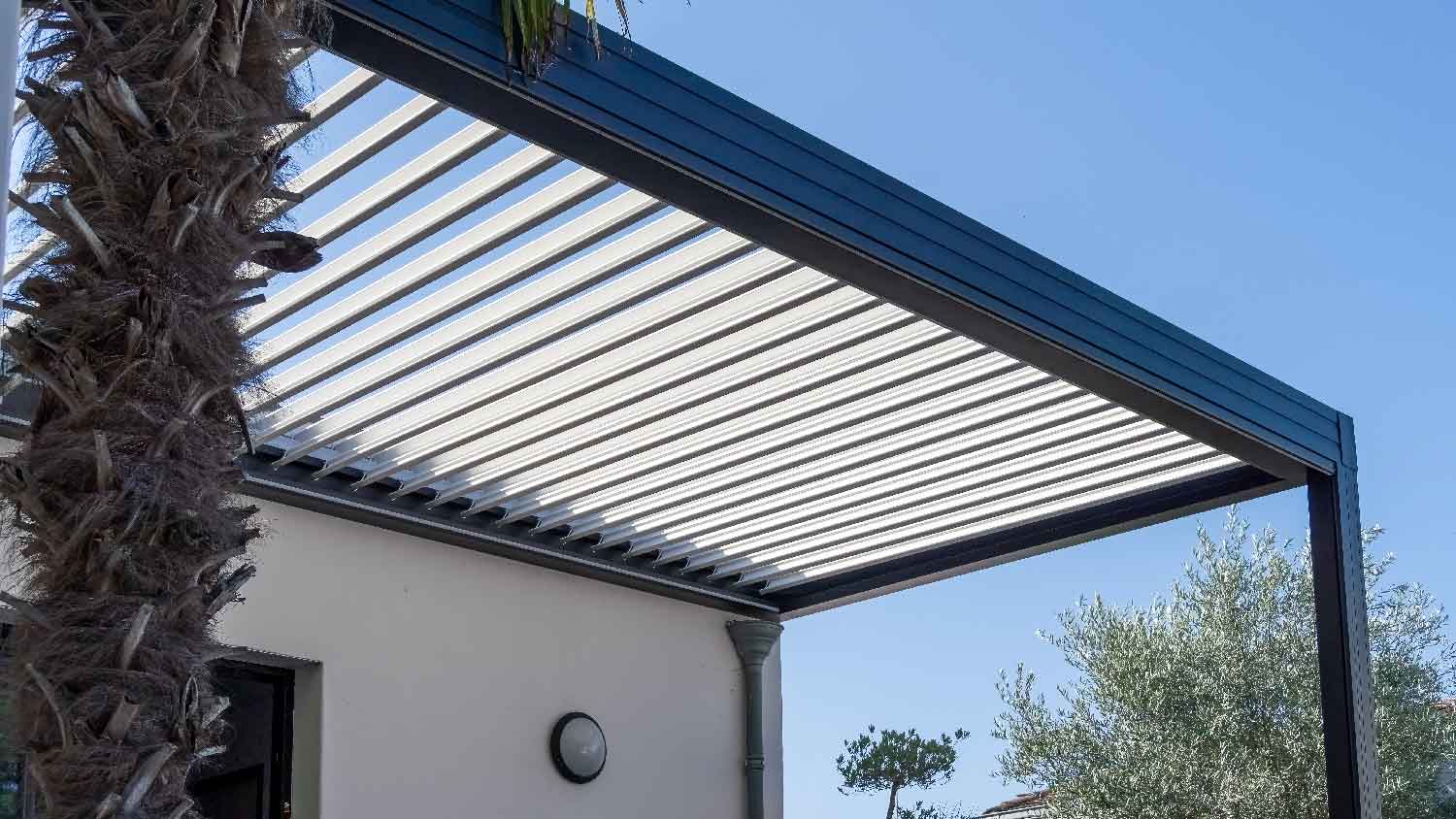 An outdoor patio pergola made of aluminum