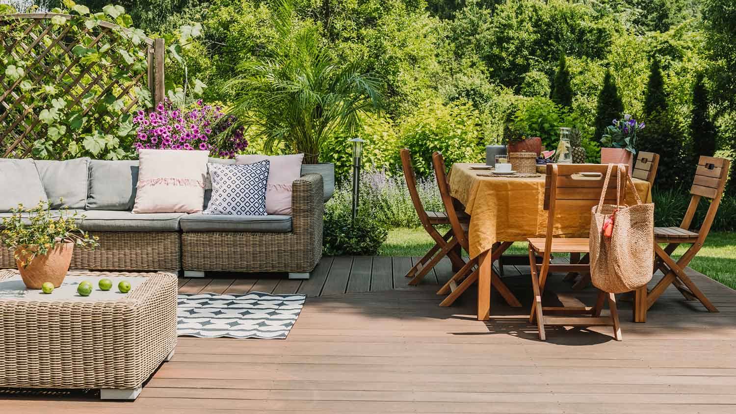 Stylish outdoor furniture on a wooden deck