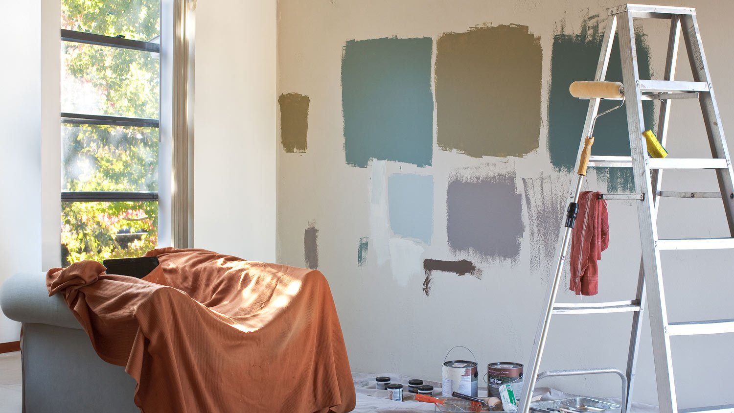 Paint samples on the living wall of an apartment