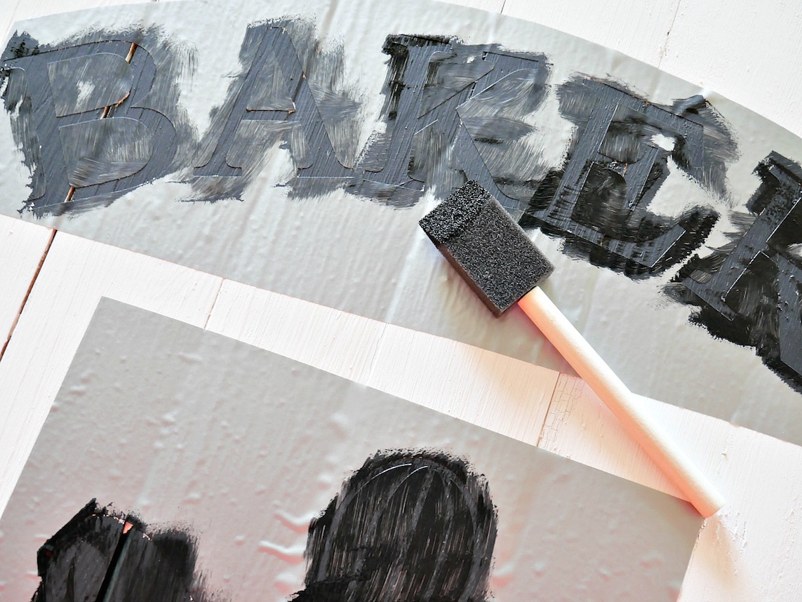 painting custom wood sign