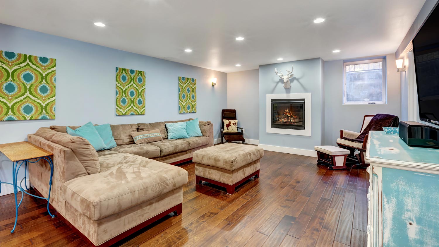 Basement with pastel blue painted walls