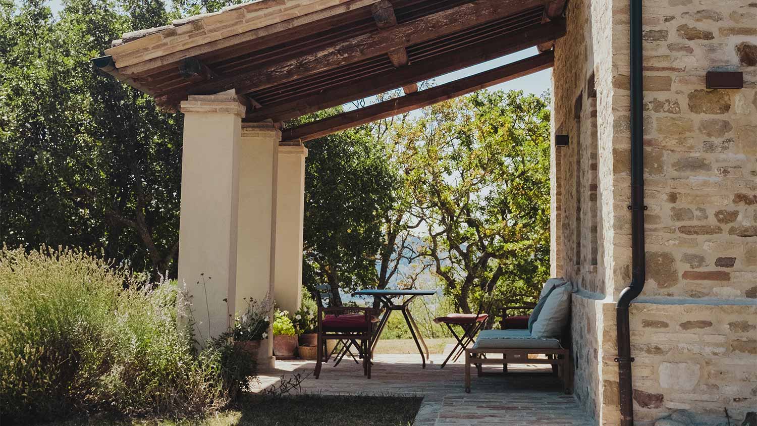 A patio with a table and seating