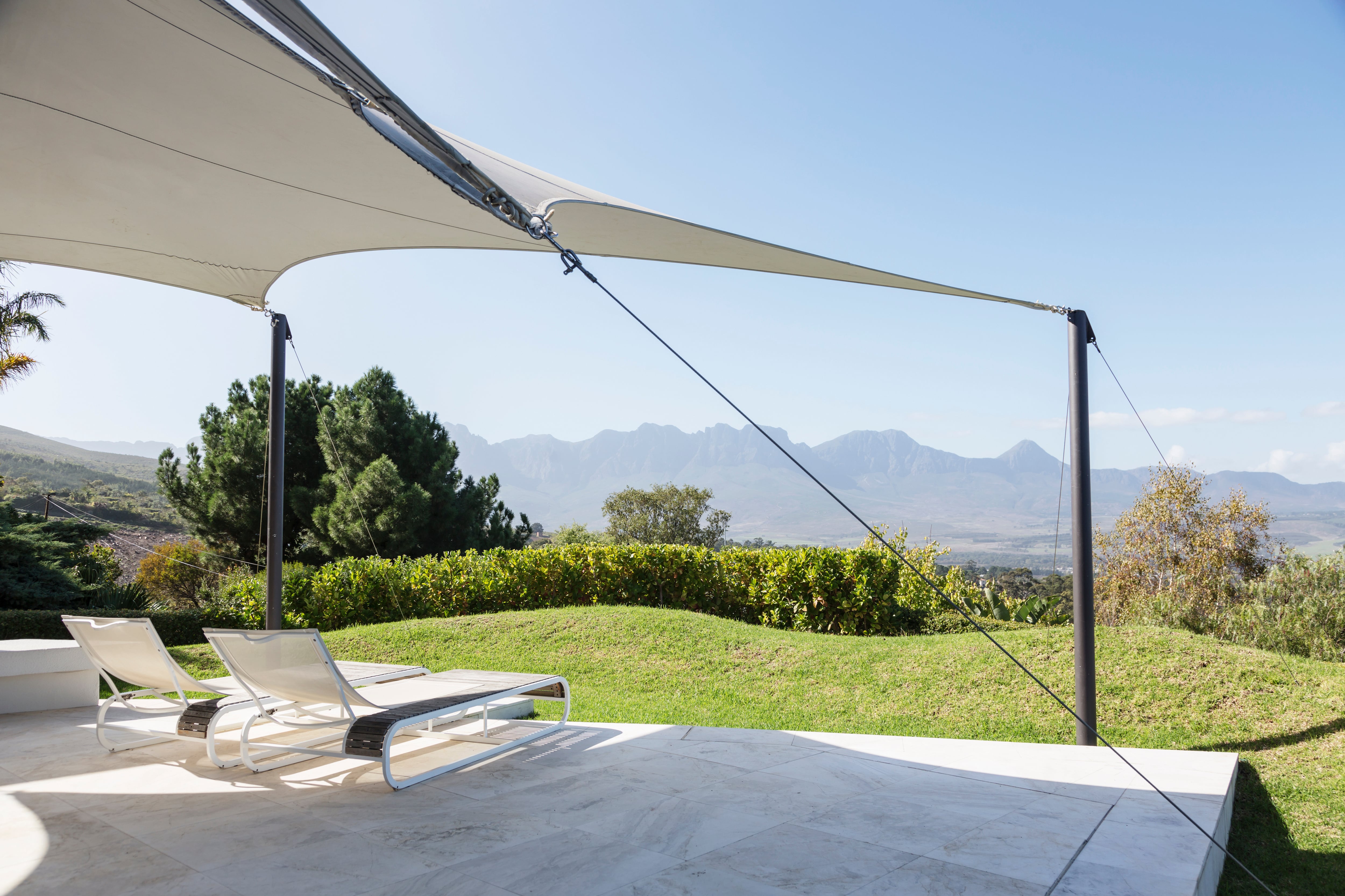 Patio with vinyl patio, deck chairs, and mountain view 