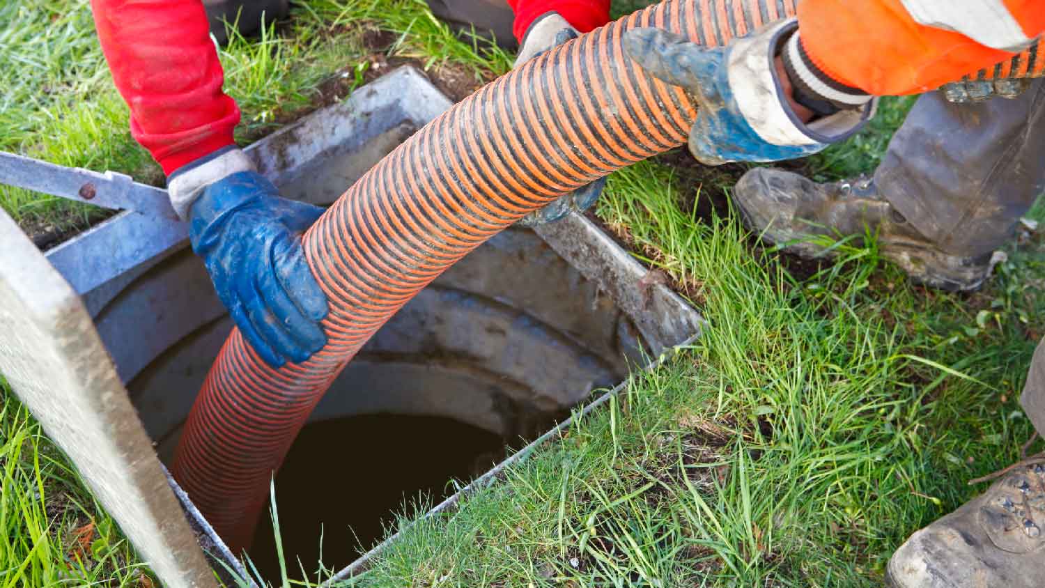 People pumping a cesspit
