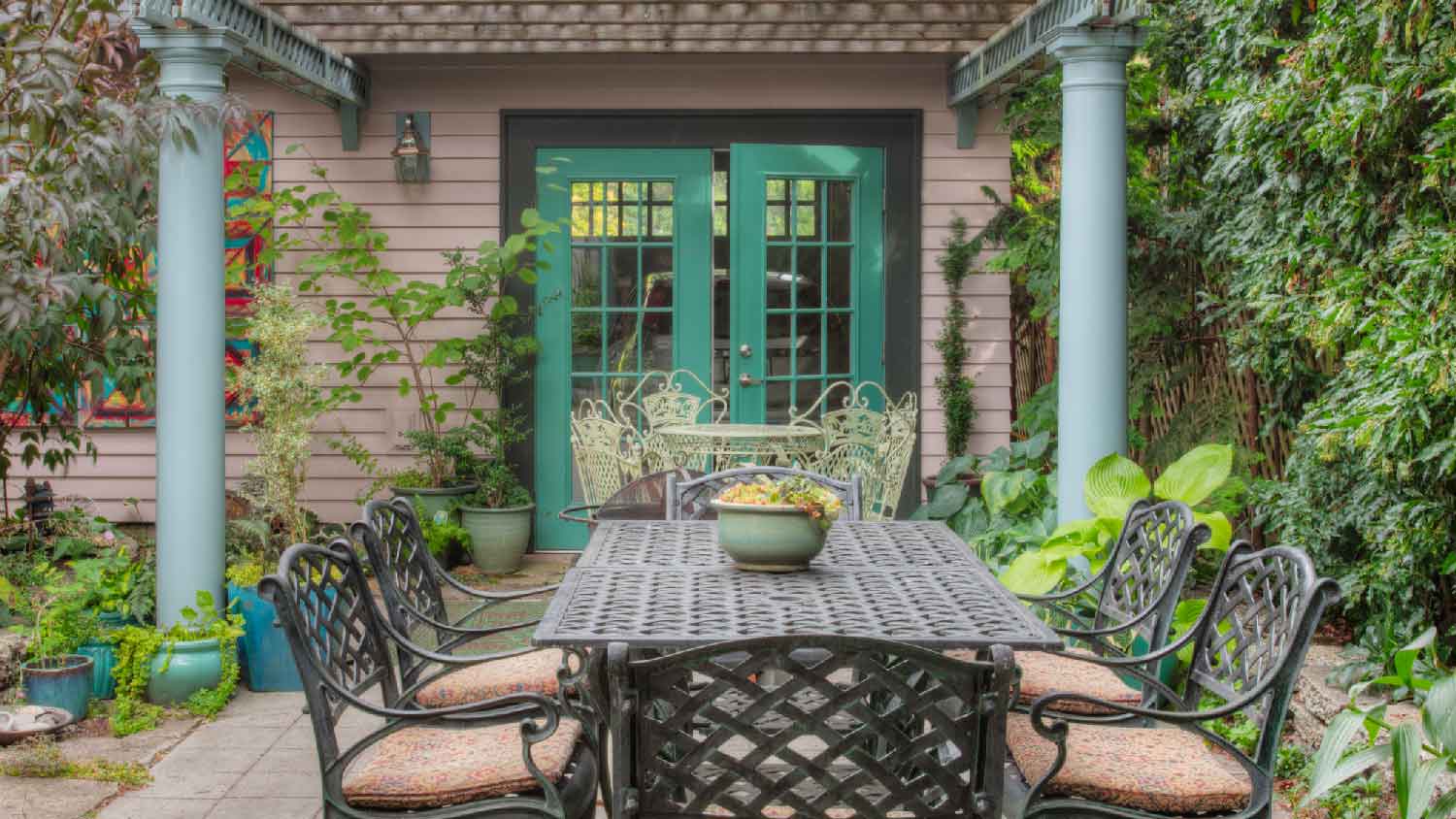 An intricate pergola attached to the house