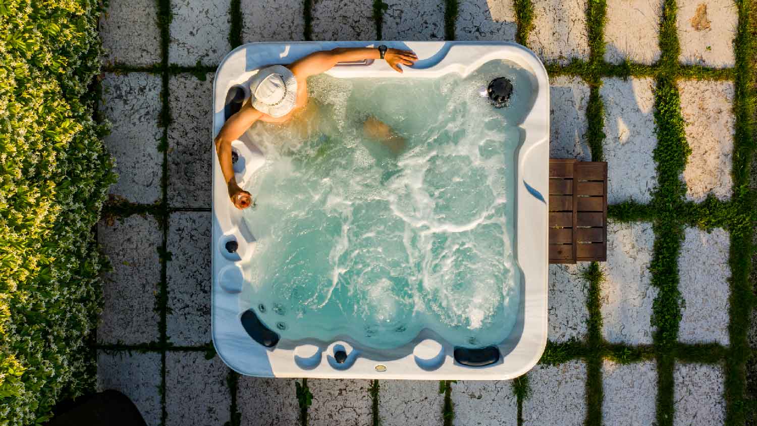 A person relaxing in a hot tub